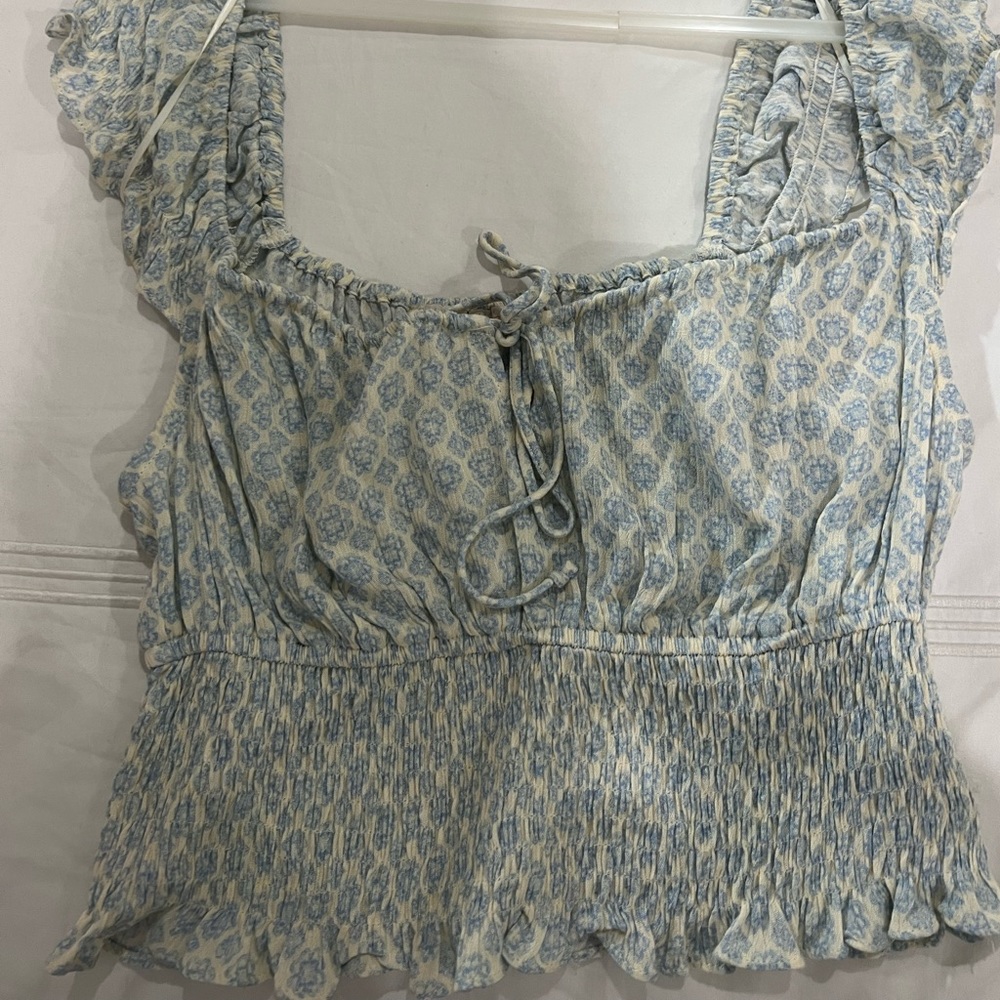 pookie and Sebastian blue top